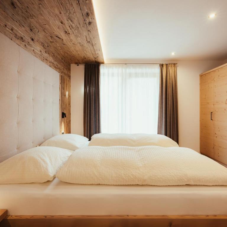 Chalet La Flüta Viola - Appartamento Deluxe con 2 Camere da Letto e Vista Giardino - 11