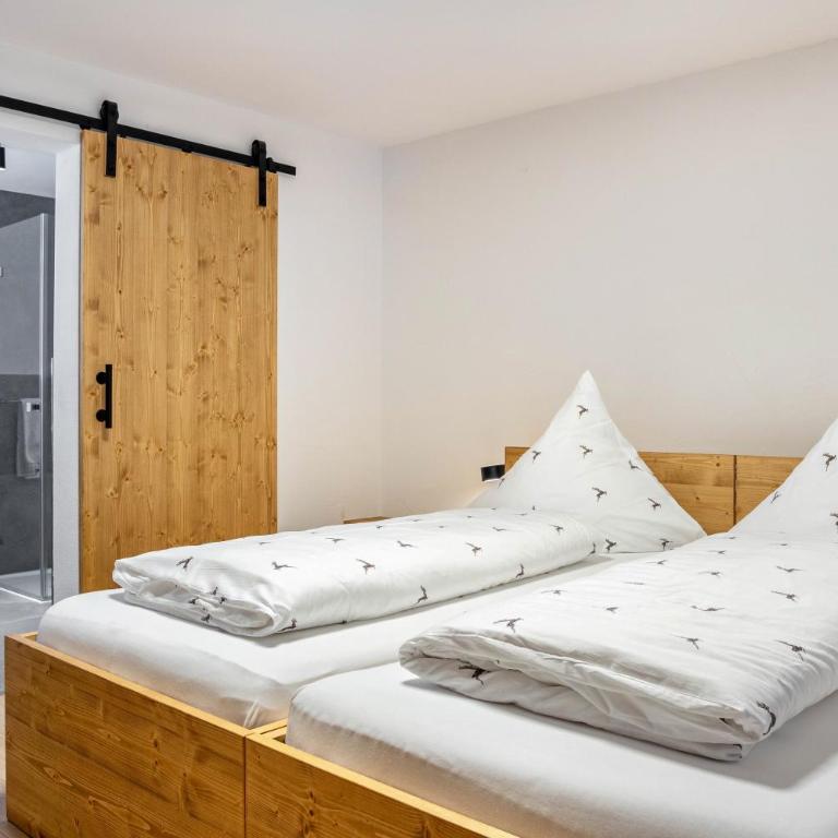 Allpano Pension und Ferienwohnungen - Deluxe-Apartment mit 2 Schlafzimmern und Gartenblick - 18