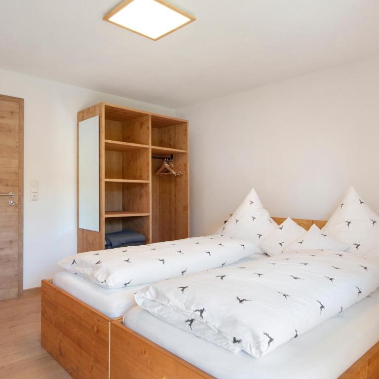 Allpano Pension und Ferienwohnungen - Deluxe-Apartment mit 2 Schlafzimmern und Gartenblick - 13