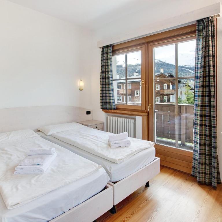 Baita Valandrea 1 - Appartamento Deluxe con 2 Camere da Letto e Vista Giardino - 12