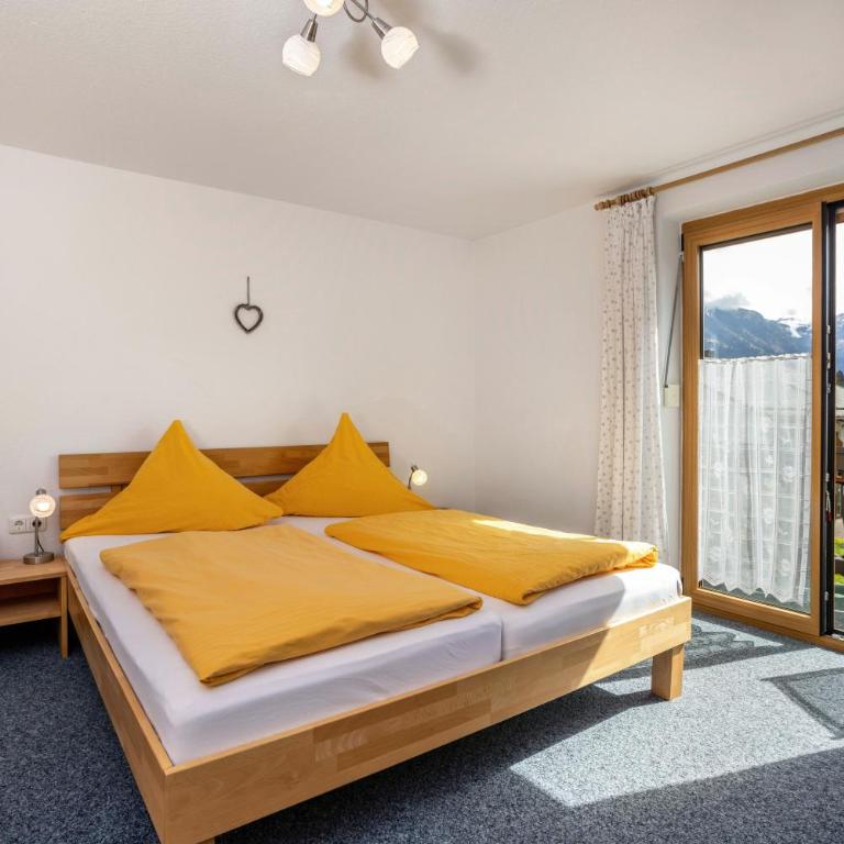 Gästehaus Vogler Oberstdorf-Kornau - Deluxe-Apartment mit 2 Schlafzimmern und Gartenblick - 2