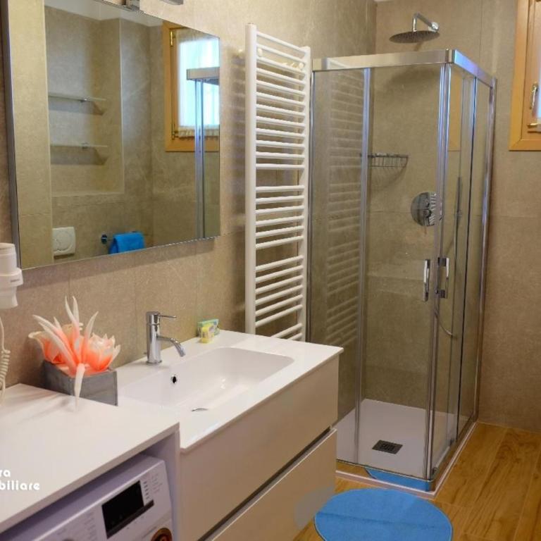 Residence Borgo dei Fiori A06 - Appartamento Deluxe con 2 Camere da Letto e Vista Giardino - 12