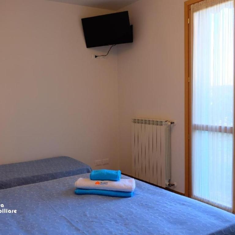 Residence Borgo dei Fiori A06 - Appartamento Deluxe con 2 Camere da Letto e Vista Giardino - 8