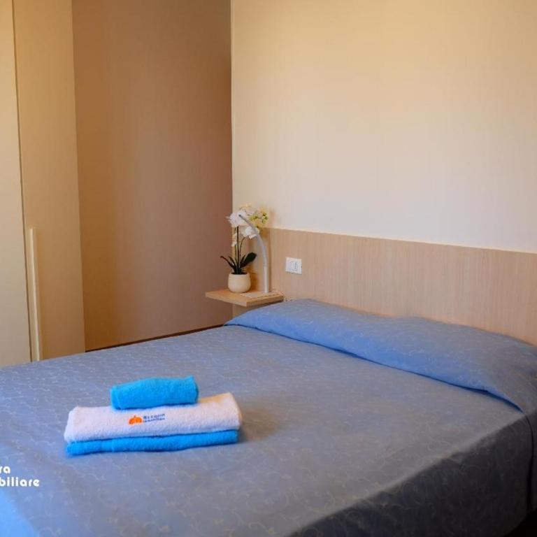 Residence Borgo dei Fiori A06 - Appartamento Deluxe con 2 Camere da Letto e Vista Giardino - 9