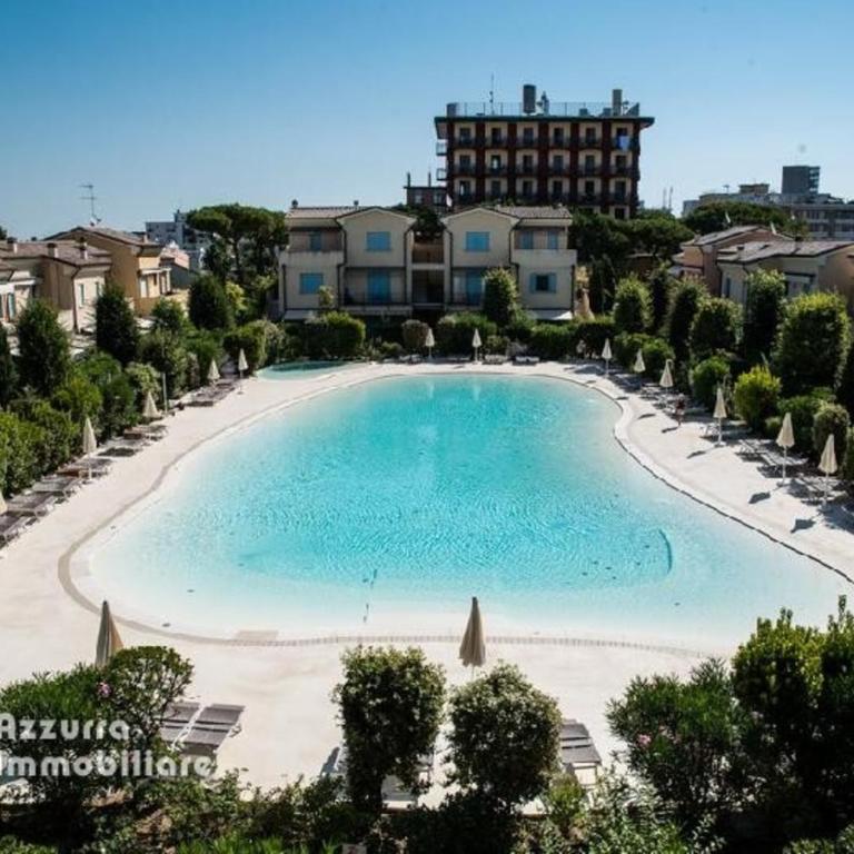Residence Borgo dei Fiori A06 - Appartamento Deluxe con 2 Camere da Letto e Vista Giardino - 1