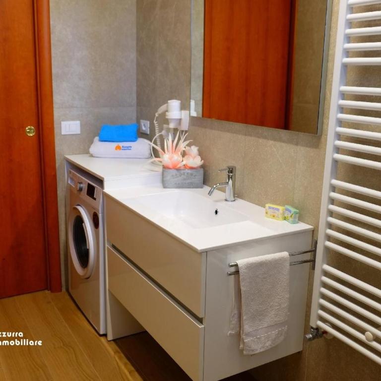 Residence Borgo dei Fiori A06 - Appartamento Deluxe con 2 Camere da Letto e Vista Giardino - 13