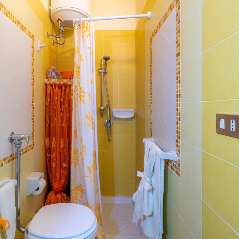 Villa le tre Commari - Arancione - Appartamento Deluxe con 2 Camere da Letto e Vista Giardino - 17