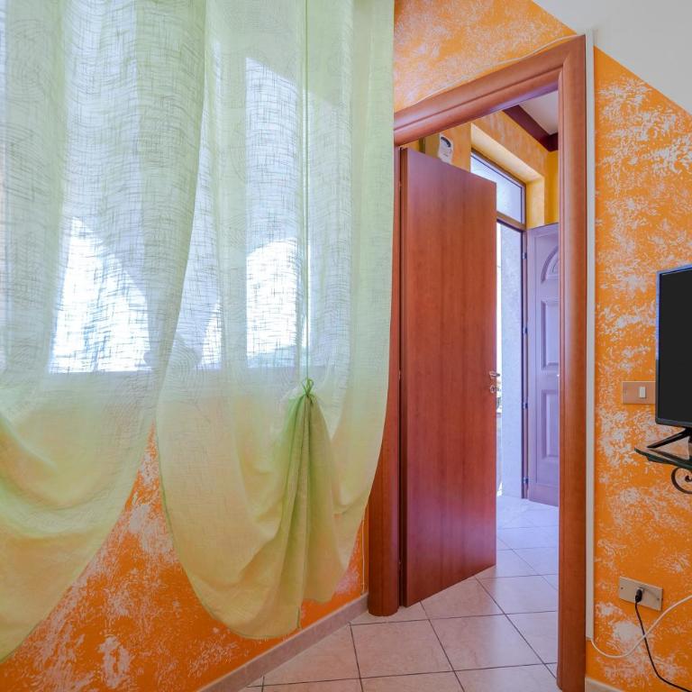 Villa le tre Commari - Arancione - Appartamento Deluxe con 2 Camere da Letto e Vista Giardino - 14