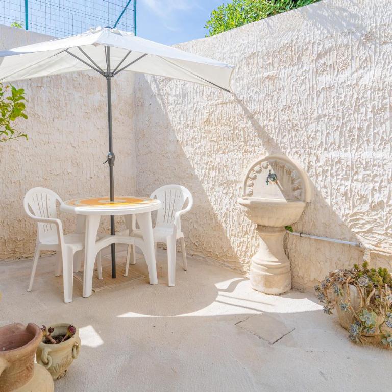 Villa le tre Commari - Arancione - Appartamento Deluxe con 2 Camere da Letto e Vista Giardino - 21
