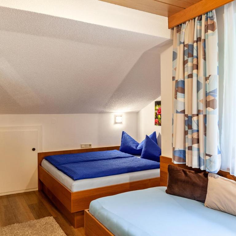 Haus Alpenheim Apartment 1 - Deluxe-Apartment mit 2 Schlafzimmern und Gartenblick - 18
