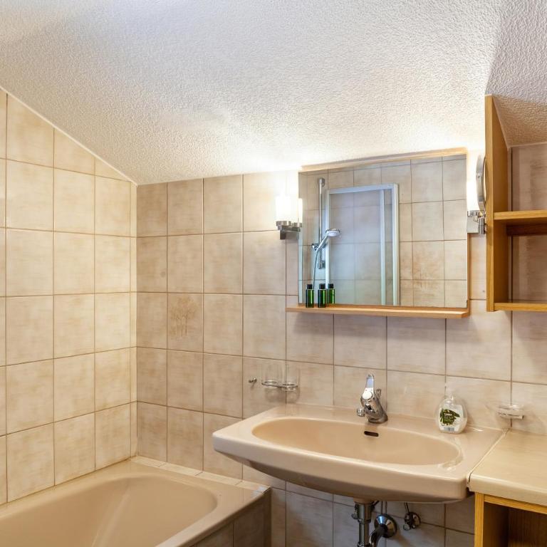 Haus Alpenheim Apartment 1 - Deluxe-Apartment mit 2 Schlafzimmern und Gartenblick - 24