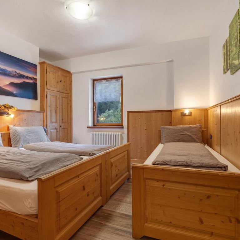 Agriturismo Maso Rocca - Appartamento Deluxe con 2 Camere da Letto e Vista Giardino - 10