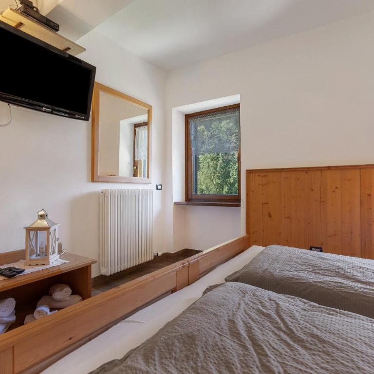 Agriturismo Maso Rocca - Appartamento Deluxe con 2 Camere da Letto e Vista Giardino - 2