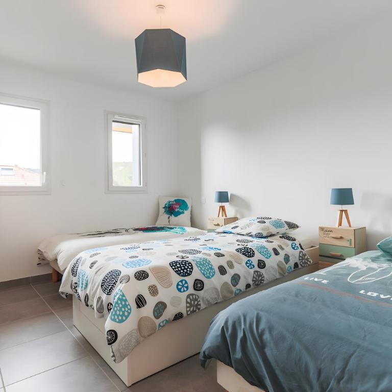 T3 Clim et Terrasse, Plage et Surf - Two-Bedroom Deluxe Apartment with Garden View - 9