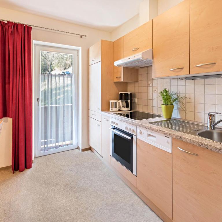 Ferienwohnung Helena - Appartamento Deluxe con 2 Camere da Letto e Vista Giardino - 8