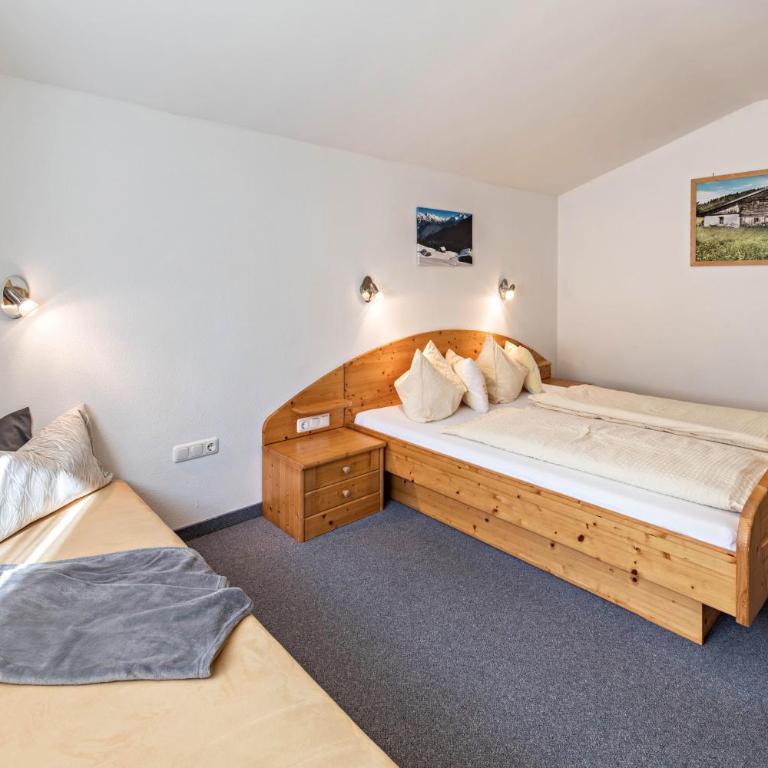 Ferienwohnung Helena - Appartamento Deluxe con 2 Camere da Letto e Vista Giardino - 14