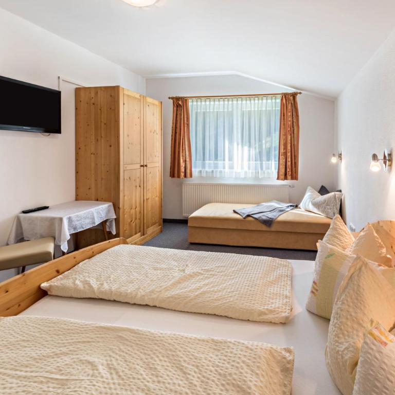 Ferienwohnung Helena - Appartamento Deluxe con 2 Camere da Letto e Vista Giardino - 12