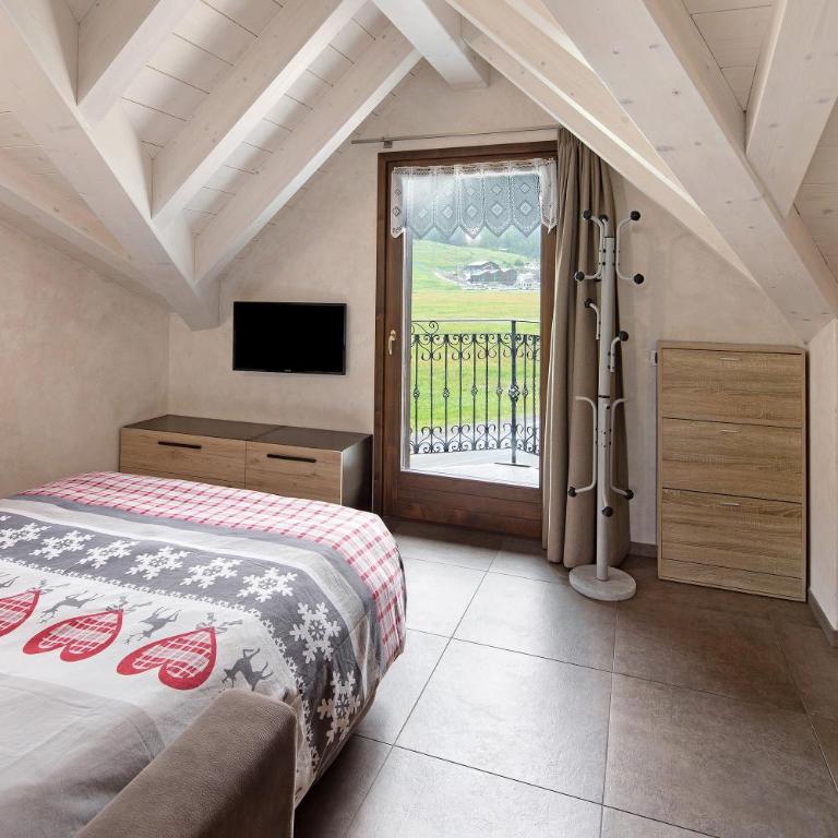 Appartamenti Arcobaleno Bianco - Appartamento Deluxe con 2 Camere da Letto e Vista Giardino - 8
