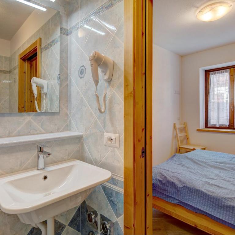 Chalet Meridiana Appartamento 6 - Appartamento Deluxe con 2 Camere da Letto e Balcone - 13