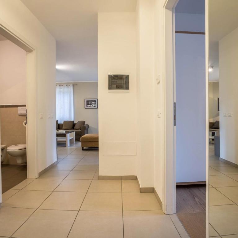 Residence La Villa Tesoro - Appartamento Deluxe con 2 Camere da Letto e Vista Giardino - 15