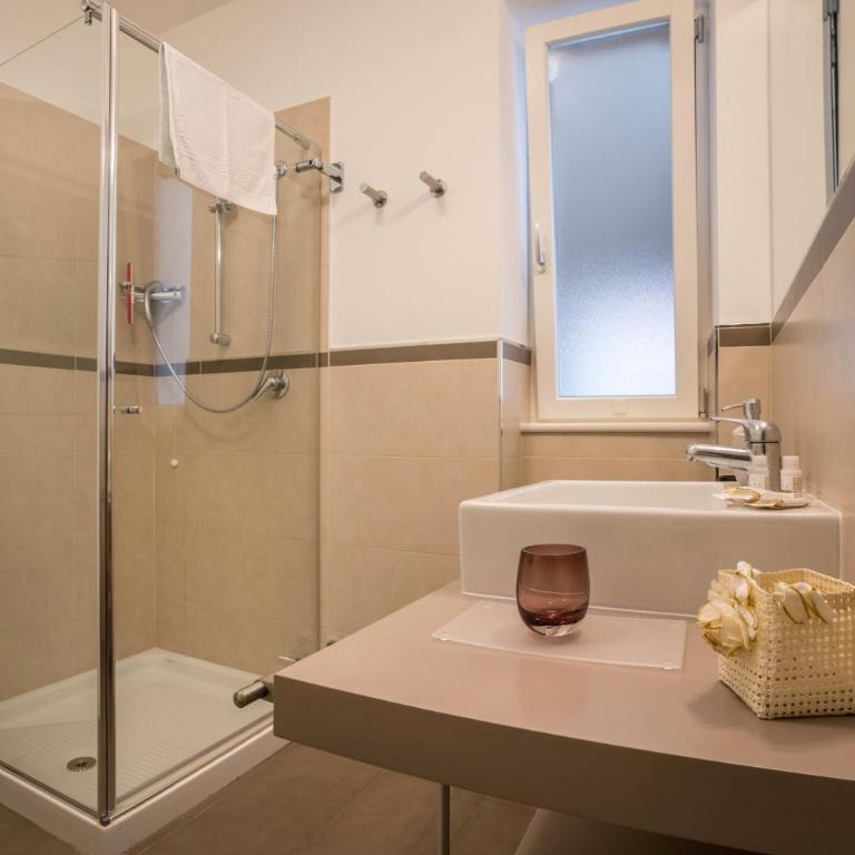 Residence La Villa Tesoro - Appartamento Deluxe con 2 Camere da Letto e Vista Giardino - 13