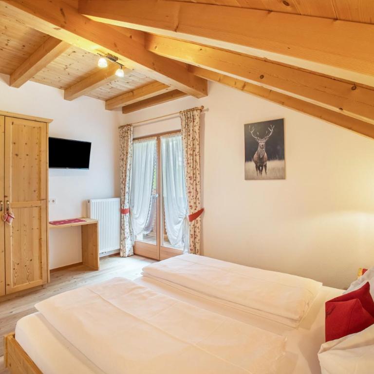 Stoffnerhof Apt Alpenrose - Appartamento Deluxe con 2 Camere da Letto e Vista Giardino - 17