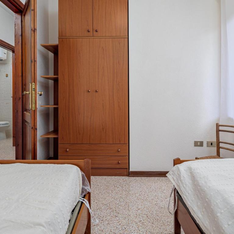 Quadrilocale Via D'annunzio - Appartamento Premium con 3 Camere da Letto e Balcone - 17