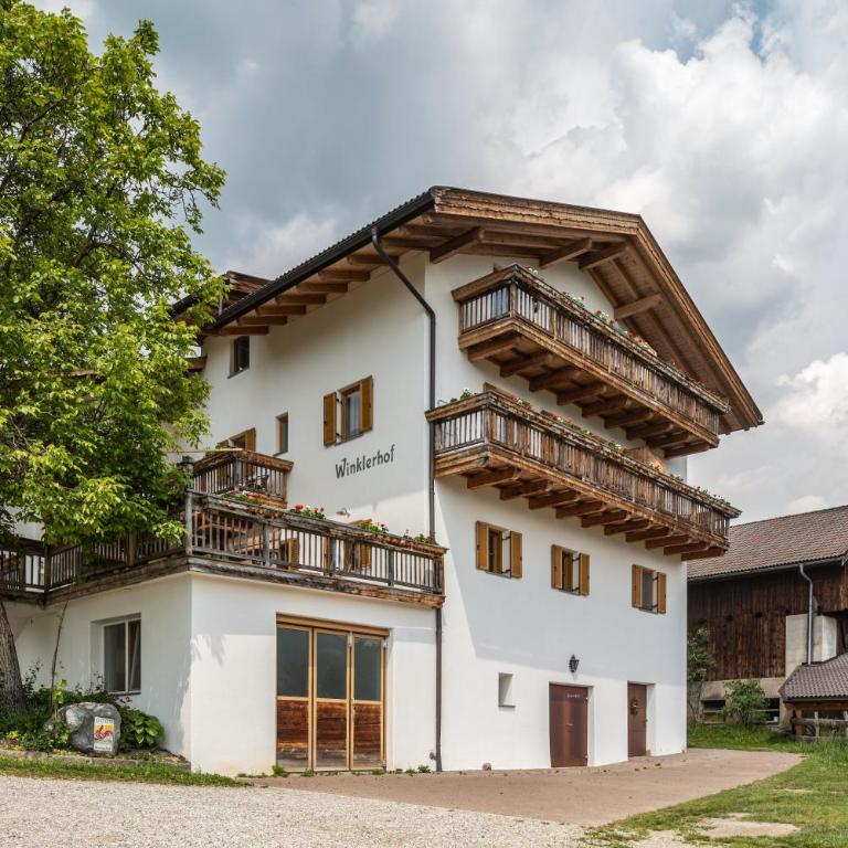 App Dolomiten Winklerhof - Deluxe-Apartment mit 2 Schlafzimmern und Gartenblick - 24