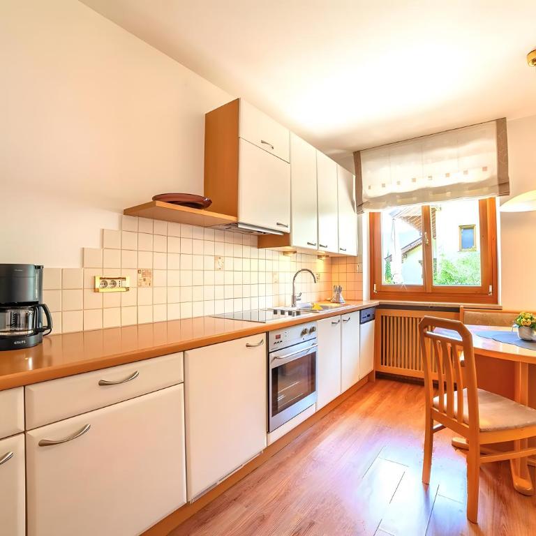 Apartments Tratter - Appartamento Deluxe con 2 Camere da Letto e Vista Giardino - 4