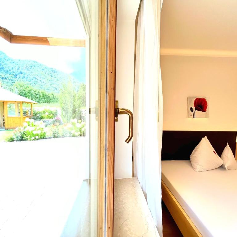Apartments Tratter - Appartamento Deluxe con 2 Camere da Letto e Vista Giardino - 8