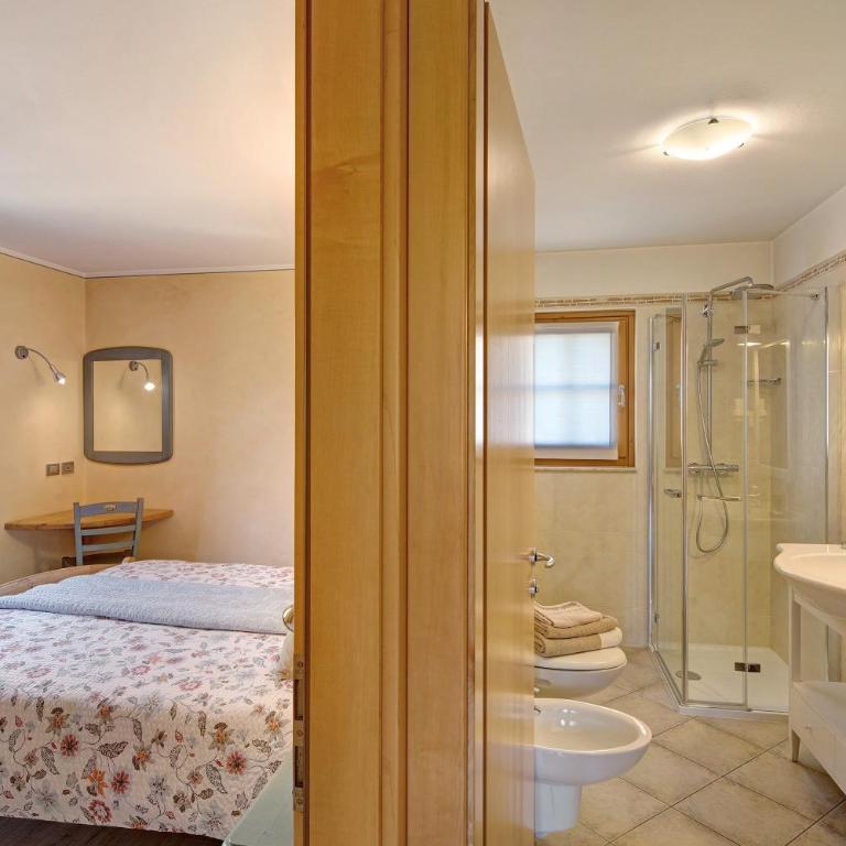 Sole Chalet Martina - Appartamento Deluxe con 2 Camere da Letto e Vista Giardino - 14