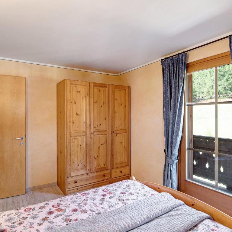 Sole Chalet Martina - Appartamento Deluxe con 2 Camere da Letto e Vista Giardino - 13