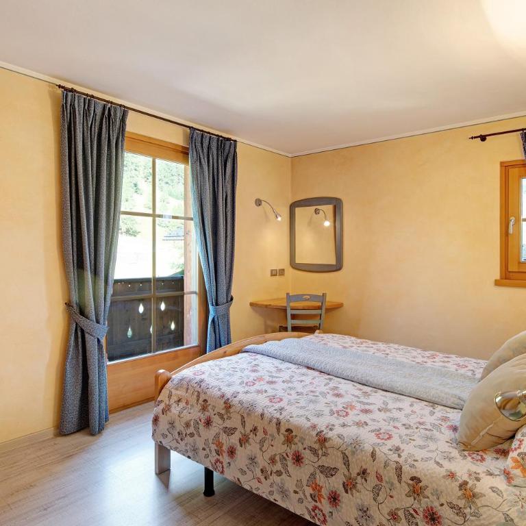 Sole Chalet Martina - Appartamento Deluxe con 2 Camere da Letto e Vista Giardino - 10