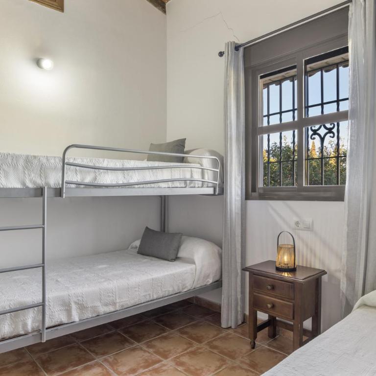 Cortijo Entrepinares - Apartamento Deluxe de 2 dormitorios con vistas al jardín - 14