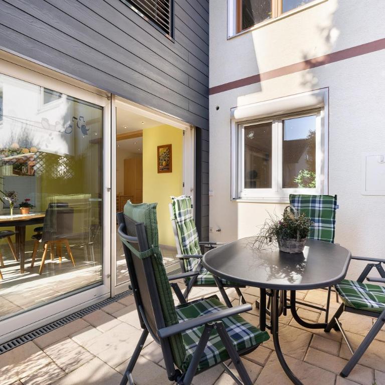 Cathleen Bohnert - One-Bedroom Apartment with Garden View - 1