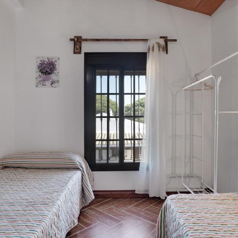 Cortijo Entrepinares - Apartamento Deluxe de 2 dormitorios con vistas al jardín - 14