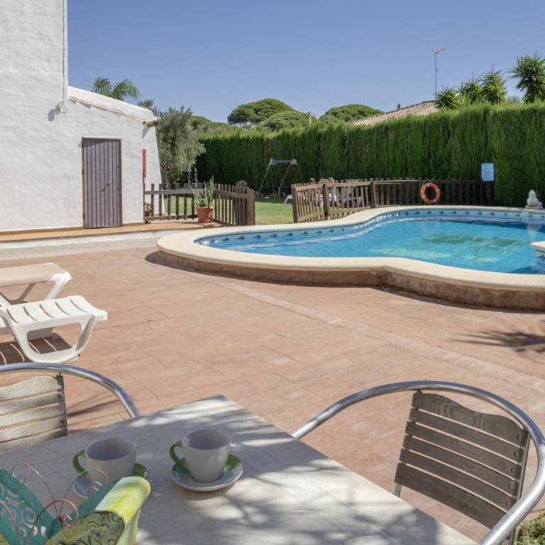 Cortijo Entrepinares - Habitación Triple con vistas al jardín - 17