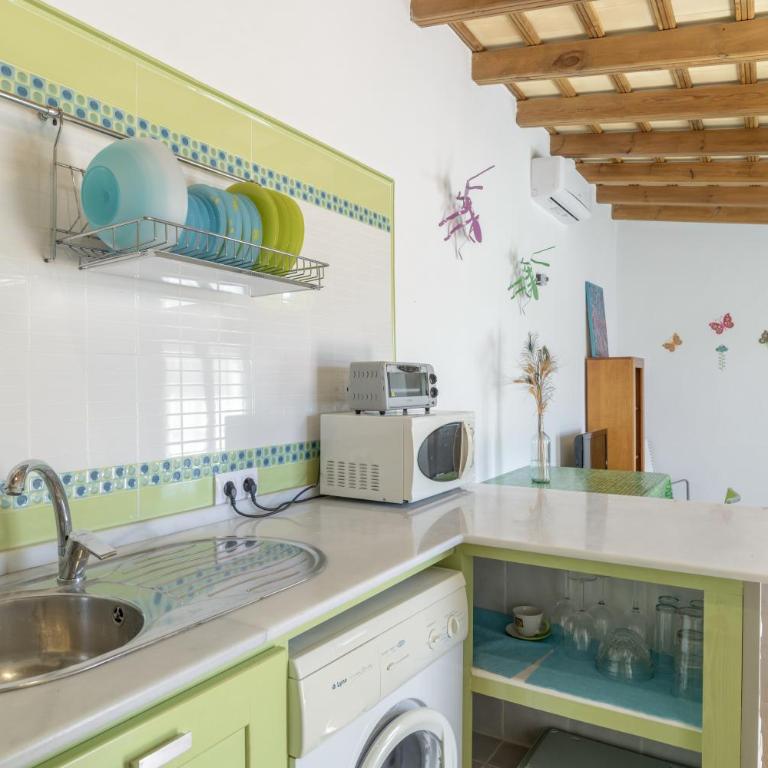 Cortijo Entrepinares - Habitación Triple con vistas al jardín - 7