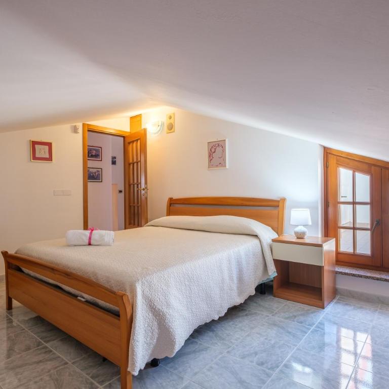 Casa vacanza puro relax - Appartamento Deluxe con 2 Camere da Letto e Vista Oceano - 12