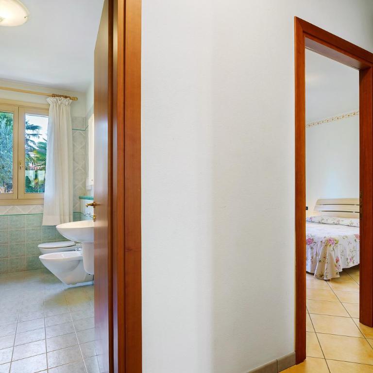 Residence Valentina - Piano terra - Appartamento Deluxe con 2 Camere da Letto e Vista Giardino - 21