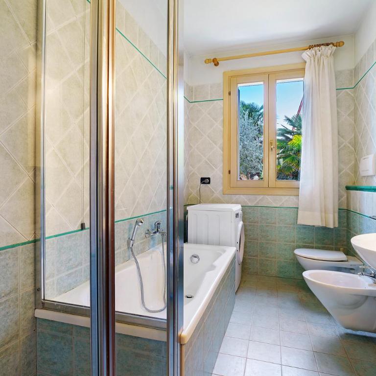 Residence Valentina - Piano terra - Appartamento Deluxe con 2 Camere da Letto e Vista Giardino - 22