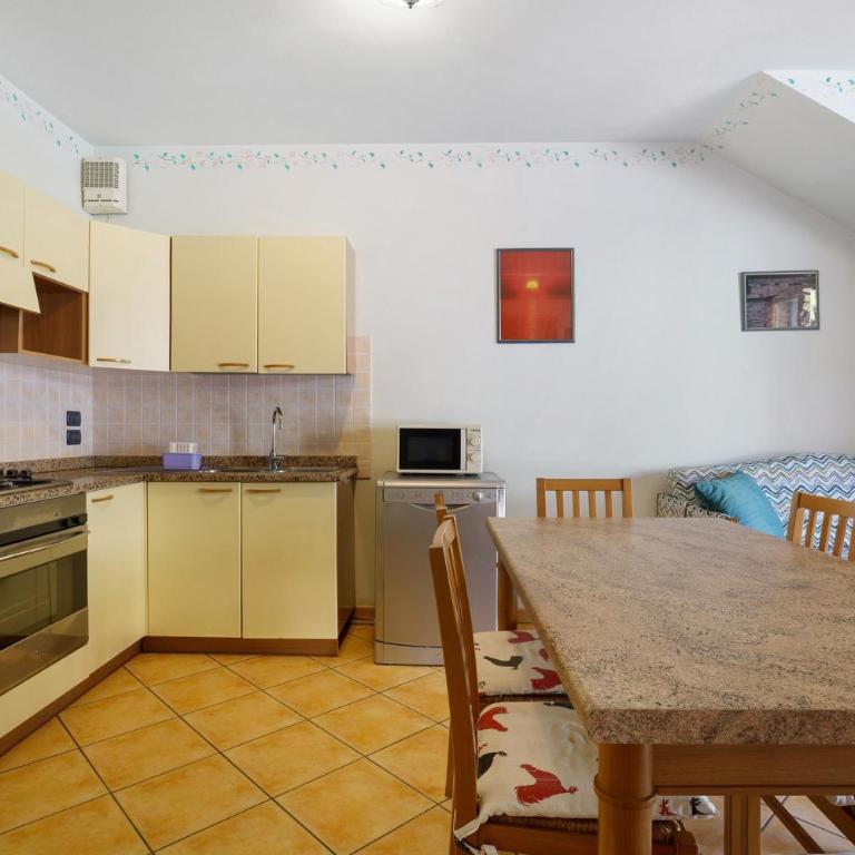 Residence Valentina - Piano terra - Appartamento Deluxe con 2 Camere da Letto e Vista Giardino - 7