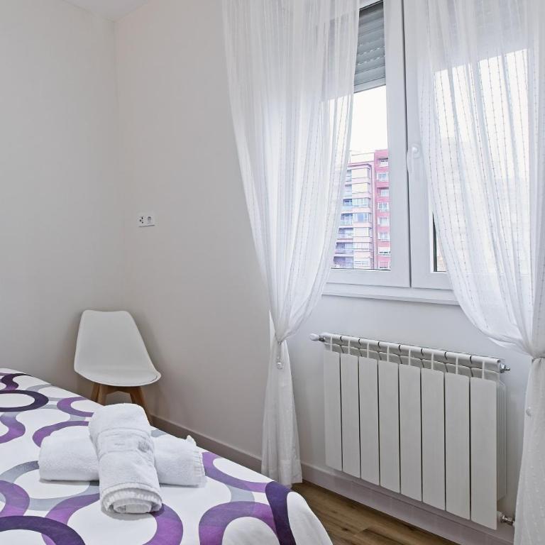 Legio Suites - Apartamento Deluxe de 2 dormitorios con vistas al jardín - 16