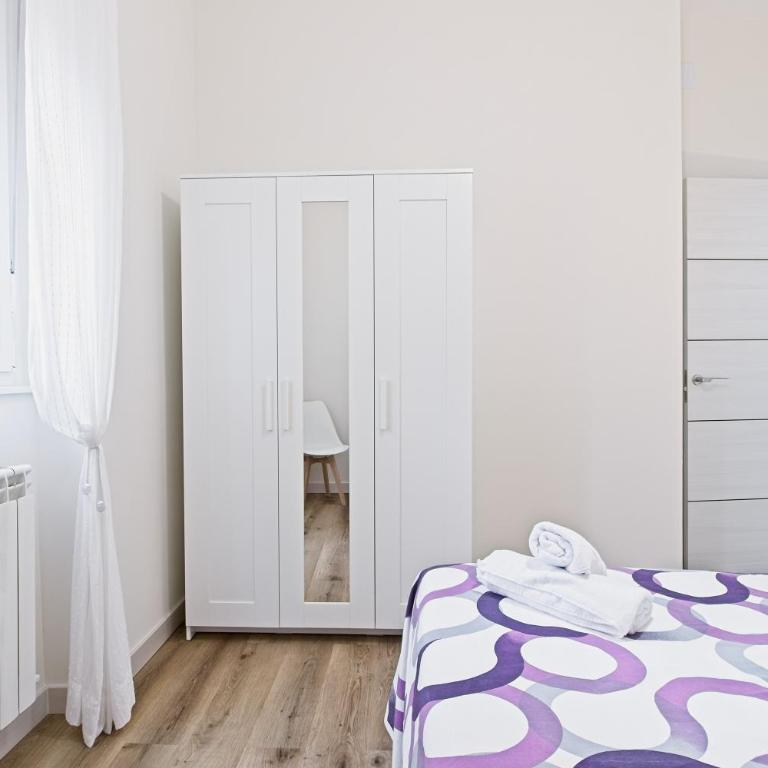 Legio Suites - Apartamento Deluxe de 2 dormitorios con vistas al jardín - 17
