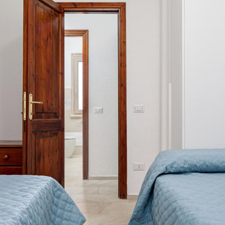 Brezza Marina Apartment- Garden - Appartamento Deluxe con 2 Camere da Letto e Vista Giardino - 16