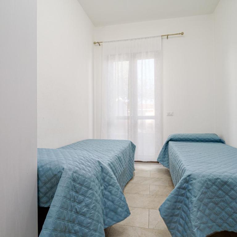 Brezza Marina Apartment- Garden - Appartamento Deluxe con 2 Camere da Letto e Vista Giardino - 13