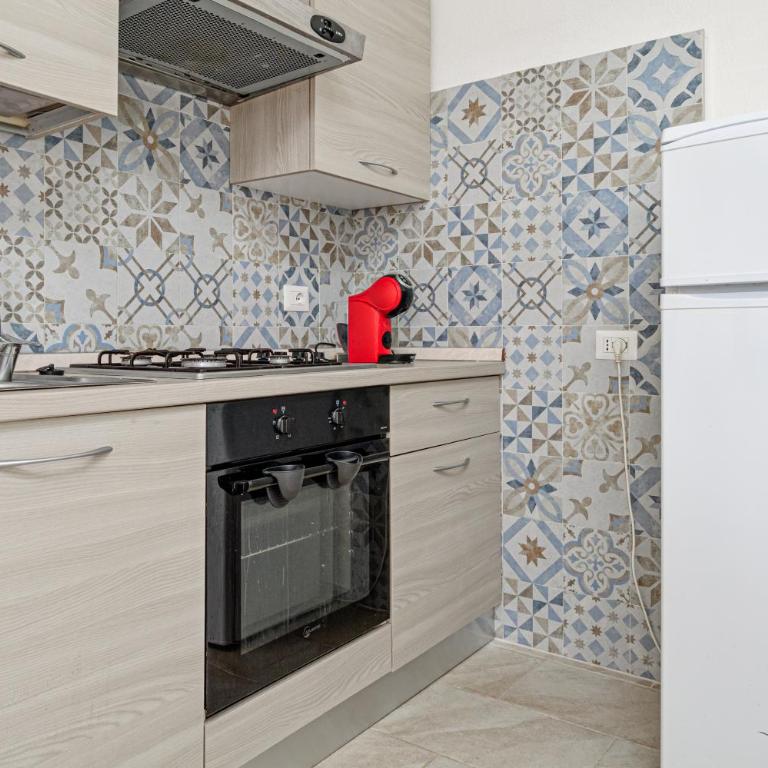Brezza Marina Apartment- Garden - Appartamento Deluxe con 2 Camere da Letto e Vista Giardino - 5