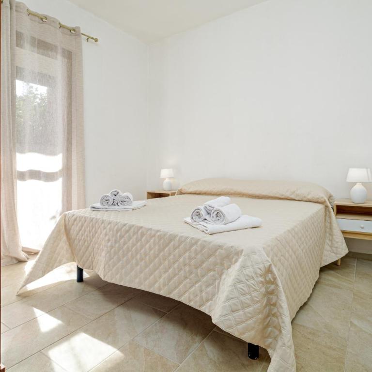 Brezza Marina Apartment- Garden - Appartamento Deluxe con 2 Camere da Letto e Vista Giardino - 7