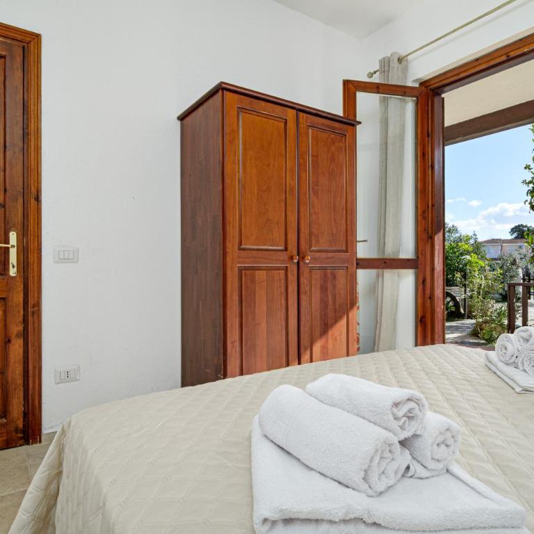 Brezza Marina Apartment- Garden - Appartamento Deluxe con 2 Camere da Letto e Vista Giardino - 8