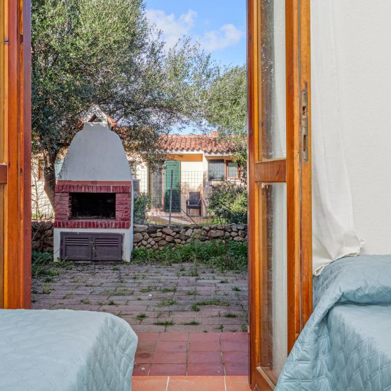 Brezza Marina Apartment- Garden - Appartamento Deluxe con 2 Camere da Letto e Vista Giardino - 14